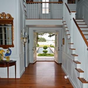 Foyer to pool view with open doors