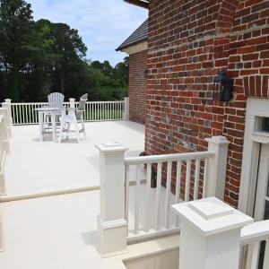 Stairwell entrance and north bedroom deck