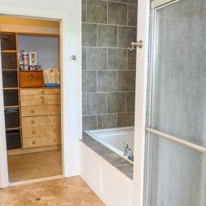 Primary Bath, Walk In Closet through Primary Bath