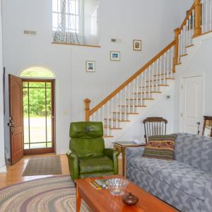 Living Room, Staircase leading up to the Guest Bedrooms and Bath