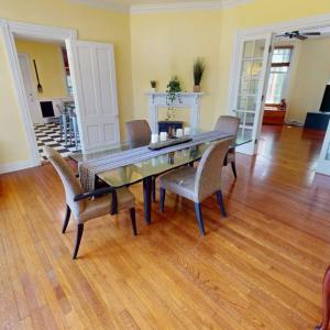 Dining room with door to kitchen and double doors