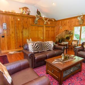 Den, This room is 26X28+- High Ceilings, Storage closets in the back corner.
