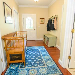 Side Front Entrance, This area leads out to the 2 car garage, laundry room, 1/2 bath, closets and second floor bonus room