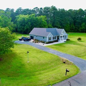 3+ acres and a paved driveway.