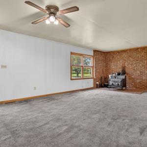 Living room with brick hearth wood stove