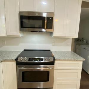 All new stainless appliances featuring a drop in range