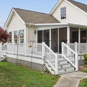 Composite deck with vinyl railings