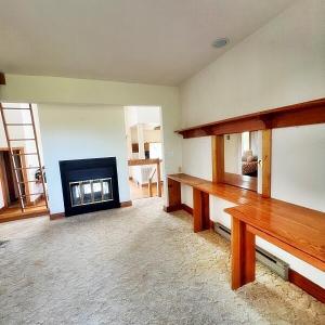 Area above living room 2-sided fireplace