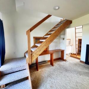 Stairs going up to loft