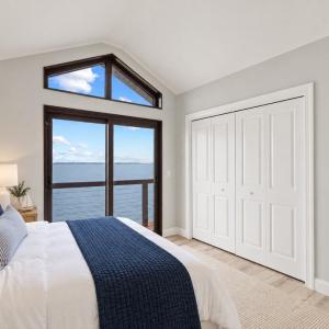 Navy Coastal Guest Room with Sailboats