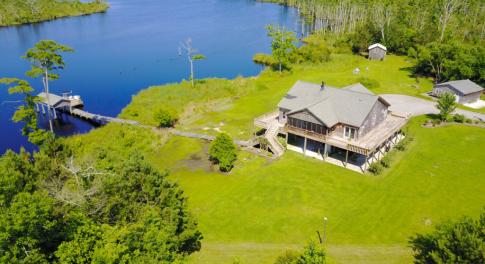 Photo of UNDER CONTRACT!  Waterfront Home with 11 Acres of Land For Sale in Tyrrell County NC!