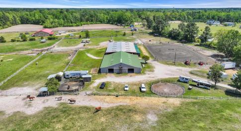 Aerial view featuring a view of trees