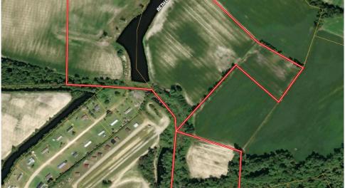 Aerial view of property's location featuring prope