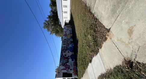 On corner of 3rd and Marstellar