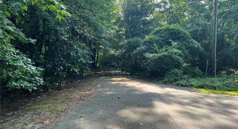 Street View - Lot begins approx 94' past utility pole on right