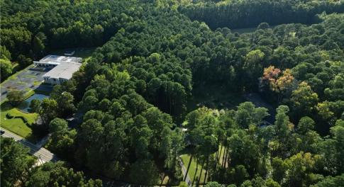 AERIAL VIEW OF WOODED ACREAGE