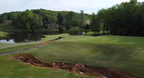 Imagine this is your back yard. Two of the most iconic holes at Tot Hill Farm with sunrises over the lake.