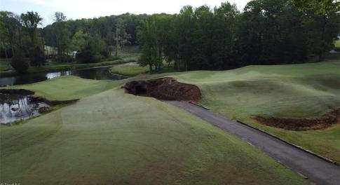 This lot offers views of the entire 12th hole land the 10th Green