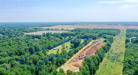 Approximate property lines drawn in blue.