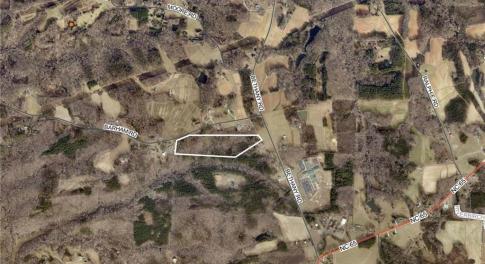 19.82 wooded acres with nearly 300 feet of road frontage
