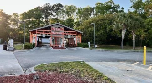 View of road with street lighting and driveway