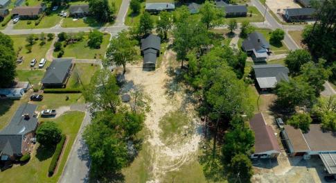 Aerial view of property and surrounding area featu