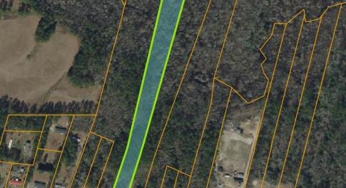 Aerial view of property's location with property p