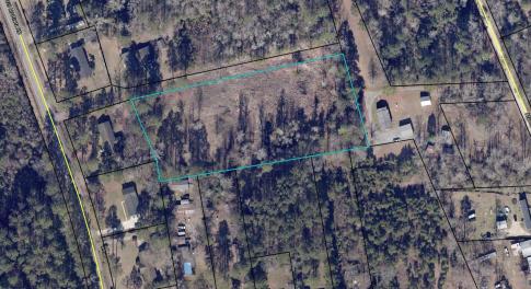 Aerial view of property's location with property p