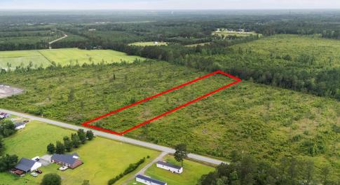 Aerial view of sparsely populated area featuring p