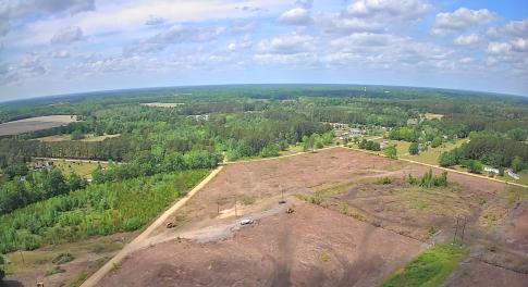 View of property location featuring a heavily wood