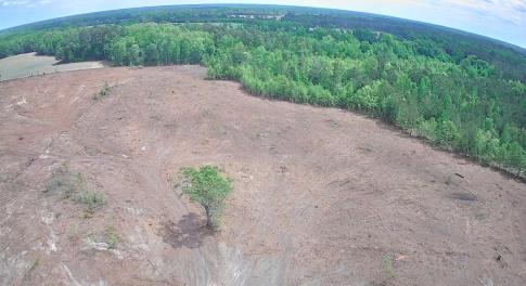 Aerial view of property and surrounding area featu