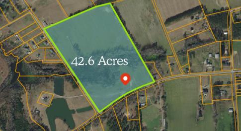 Aerial map of property and surrounding area featur