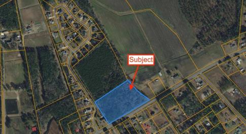 Aerial view of property's location with property p