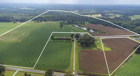 Aerial view of sparsely populated area featuring p