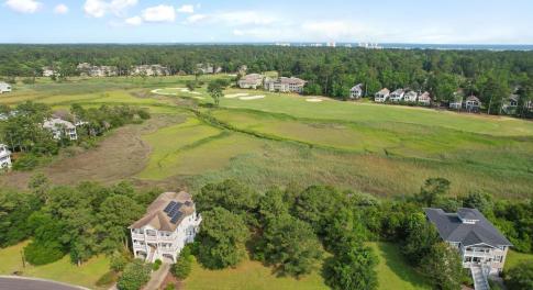 Aerial view of property's location with a heavily