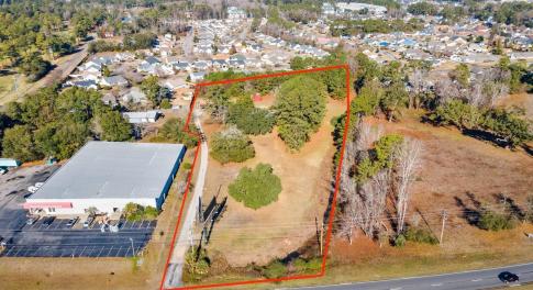 Aerial overview of property's location with proper