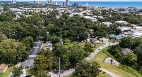 View of property location featuring nearby urban a