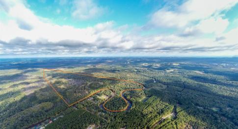Aerial view of property and surrounding area featu
