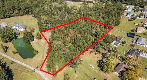 Aerial view of residential area featuring a nearby