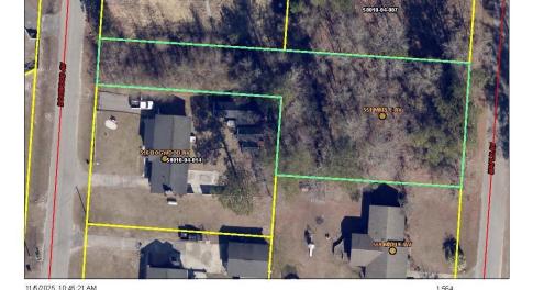 Aerial map of property and surrounding area featur