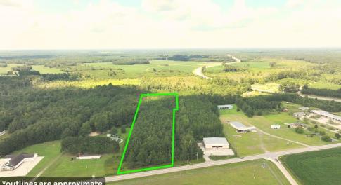 Aerial view of sparsely populated area with proper