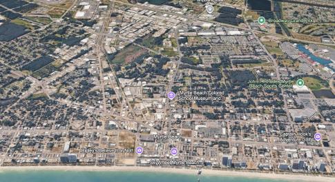 View of property location with a nearby body of wa