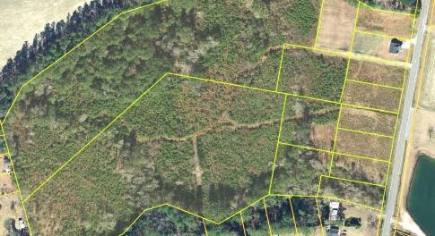 Aerial map of property and surrounding area with p