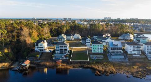 Aerial view of residential area featuring a nearby
