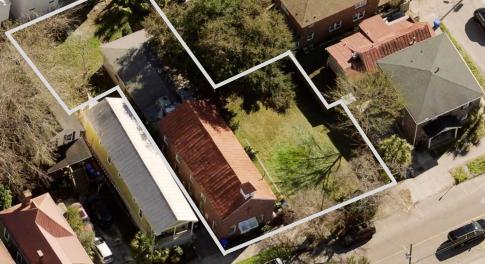 Aerial view of residential area featuring property