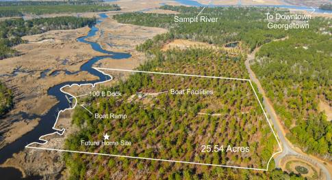 Aerial view of property and surrounding area with