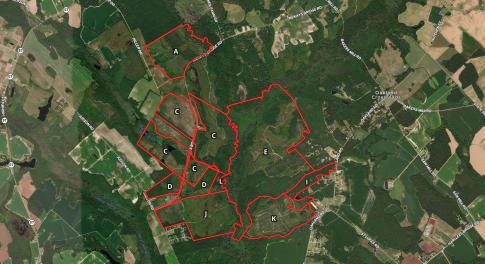 Aerial map of property and surrounding area with p