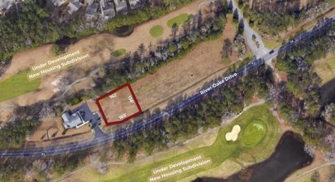 Aerial view of property's location featuring a gol