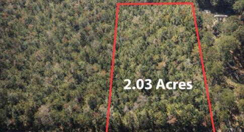 Aerial view of property's location featuring prope