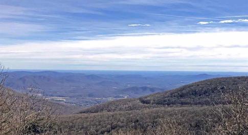 Similar Valley and Mountain views are available upon construction. This is the view from the home immediately to the left of the homesite.